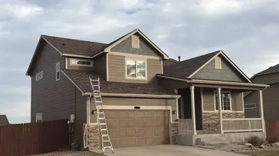 A newly resided Colorado home by Mighty Dog Roofing in Fort Collins.
