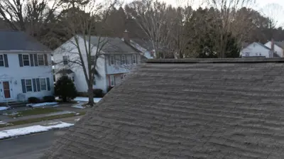 Slight roofline sag on a Cumberland Rhode Island home after heavy winter snow and spring thaw.