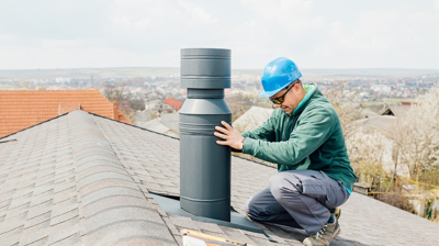 Contratista de tejados que realiza servicios de integración de chimeneas y tejados