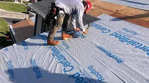 Professional roof inspector performing a mid-roof inspection on a home near the 12th Street Historic District in Golden, CO