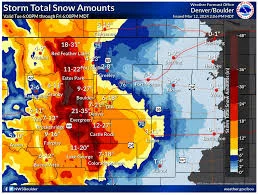 Seasonal roof maintenance inspection on a Denver, CO home with the Rocky Mountains and downtown skyline visible