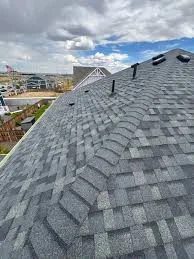 Completed triple-threat roof replacement on a Boulder, CO home near Chautauqua with the Flatirons visible